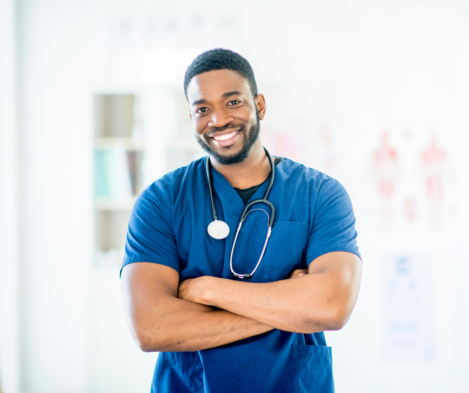 Male nurse with arms crossed